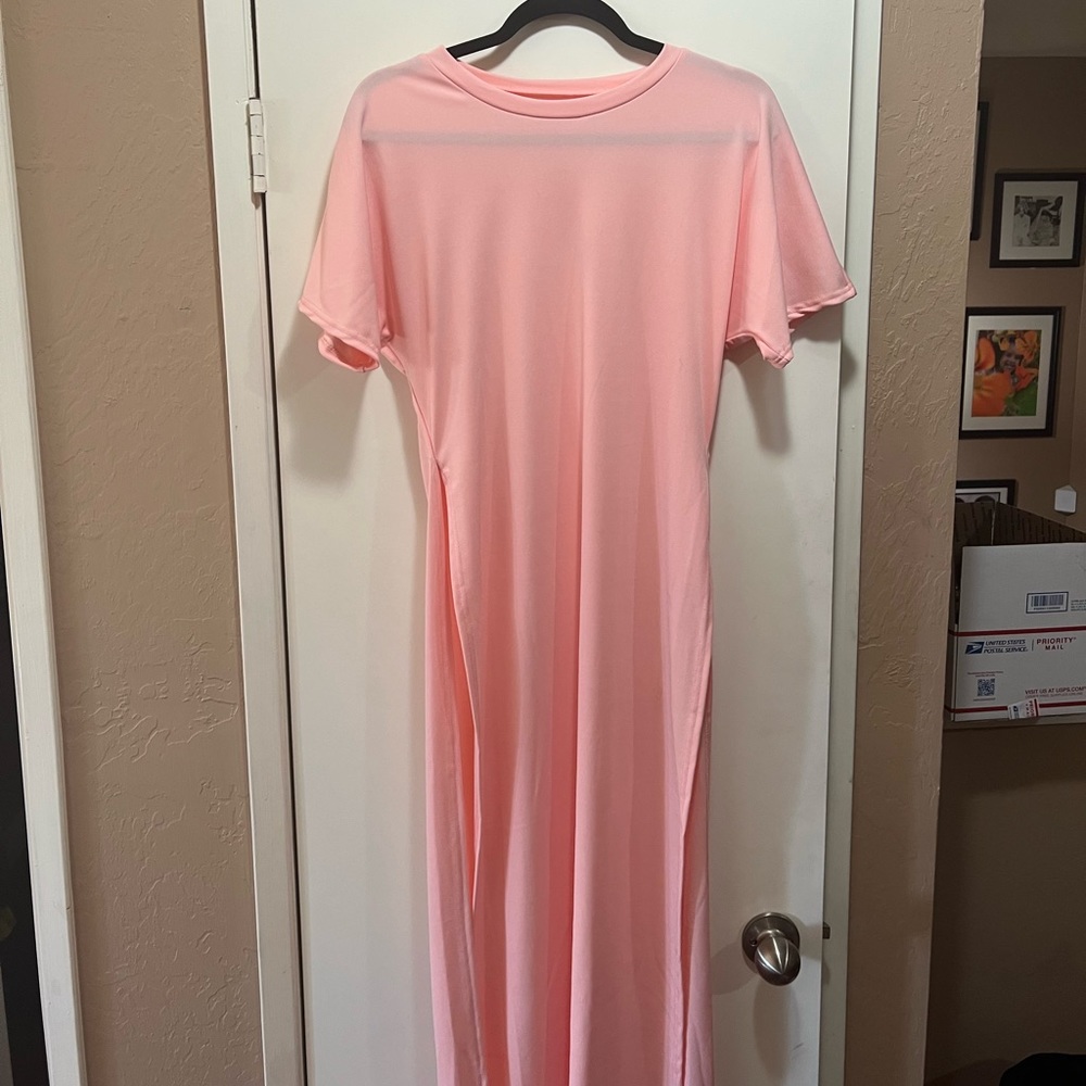 Pink cotton and polyester two piece. Labeled as Medium (Size 12). NEW!!!!!!